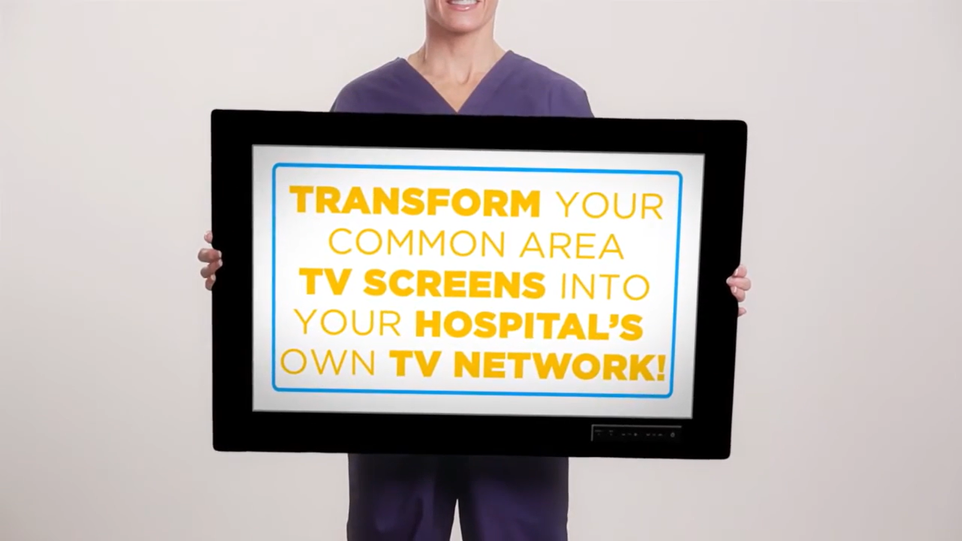 A nurse holding a television screen displaying the words Transform your common area TV screens into your hospital's own TV network!